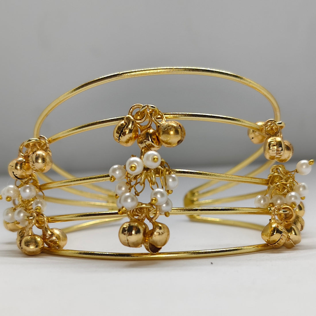 Gold-toned Multi-Layer Ghungroo Pearl Cuff Bracelet